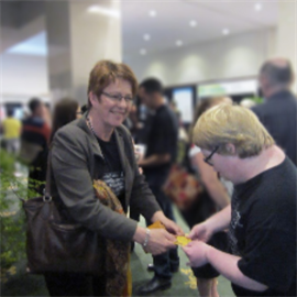 Ben and Celia Wade-Brown exchange business cards