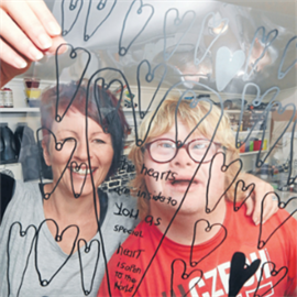 Ben and Lisa Grennell creating screen print Hearts